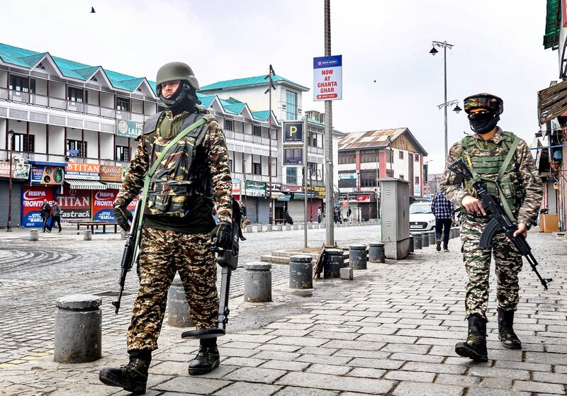 Indian paramilitary soldiers patrol a marketplace in Srinagar. Photograph: Basit Zargar/Getty Images