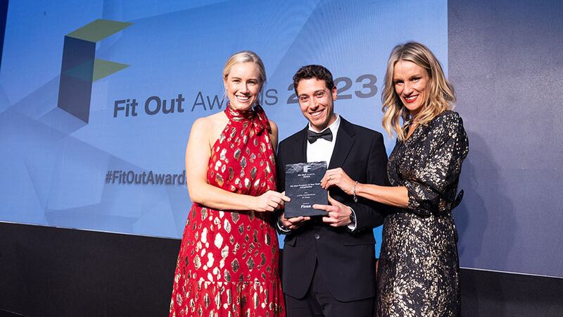 Juan Manuel Aragon Tellez, architect at Finsa Technical Consultancy at Finsa Ireland, presents the fit out project of the year – hospitality award to Lucy Rainey and Catherine Crowe, Luca Architecture