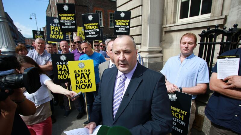 Members of the Garda Representative Association, including president Ciarán O’Neill (centre), protest outside Government Buildings at the Department of Public Expenditure and Reform last July. Photograph: Nick Bradshaw/The Irish Times