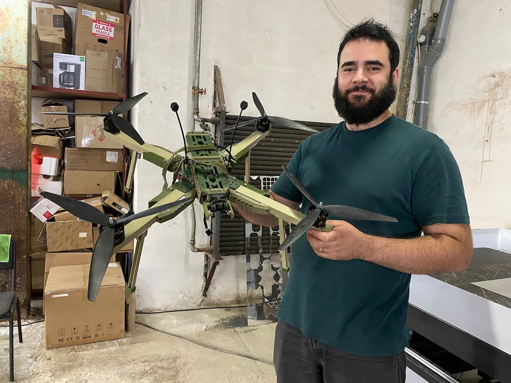 Ruslan Borovsky with a Khmara, the flagship drone built by Vitrolom, his hi-tech startup, in Lviv, Ukraine. Photograph: Lara Marlowe