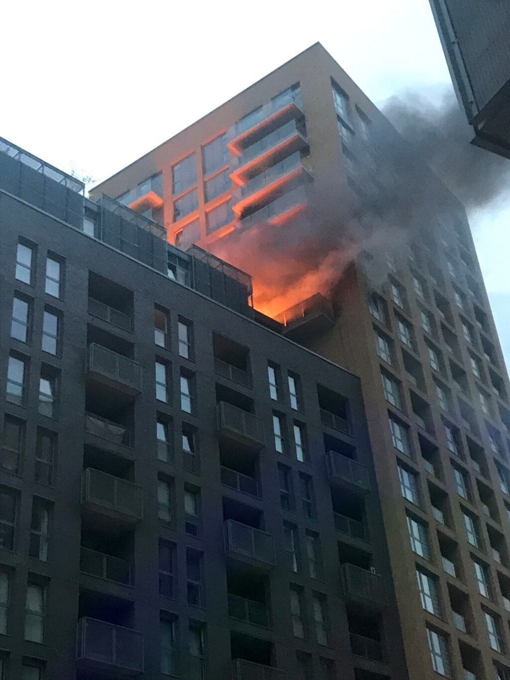A fire on the 13th floor of a 20-storey tower block in Elmira Street, Lewisham, south London. Photograph: Yusif Ali/PA Wire