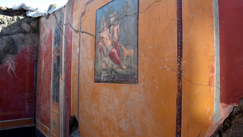 A fresco depicting Narcissus looking at himself in the mirror has been uncovered. Photograph: Pompeii Press Office / EPA