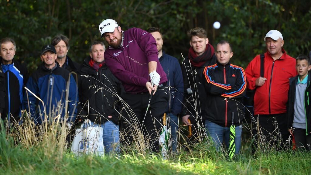 Shane Lowry of Ireland plays his third shot on the second hole during the first round of the British Masters at The Grove in Watford, England. Photo: Ross Kinnaird/Getty Images