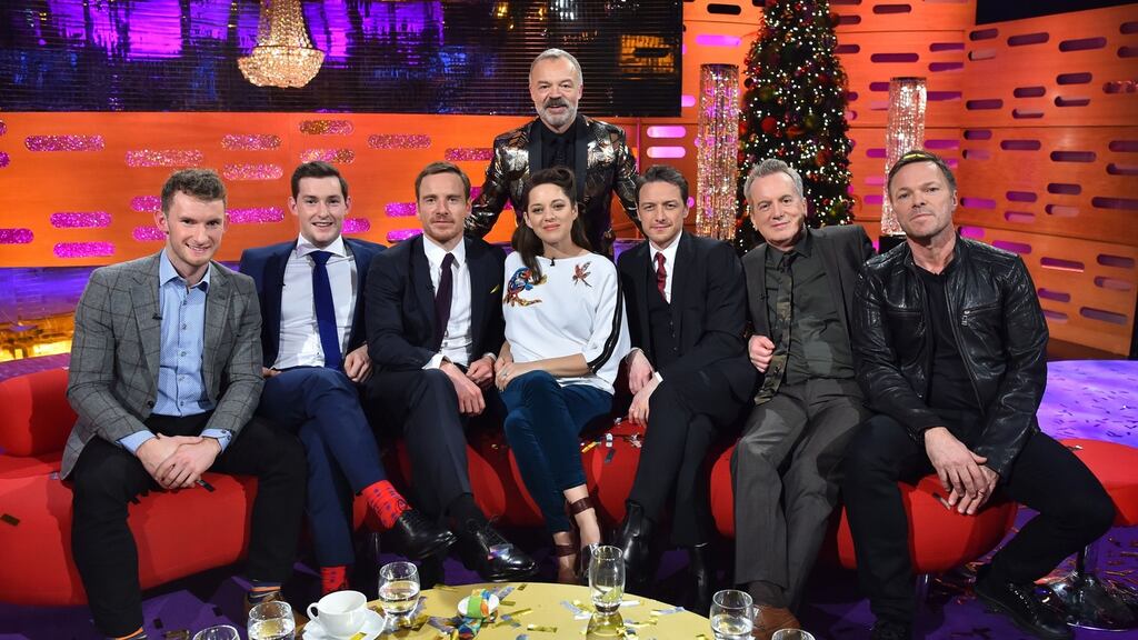 Olympic rowing silver medallists Gary and Paul O’Donovan (left and second left) with host Graham Norton and other guests on the set of the Graham Norton New Year’s Eve show. Photograph: PA