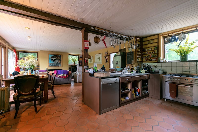 The kitchen and livingroom lie in a newer part of the house