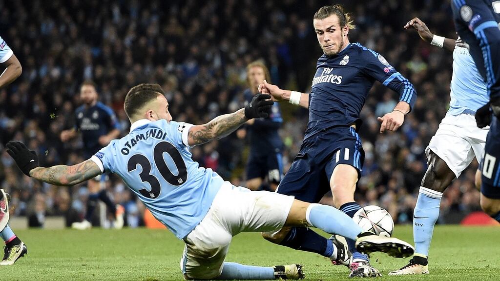 Real Madrid’s Gareth Bale is tackled by Nicolas Ottamendi of Manchester City during their Champions League semi-final clash. Photo: PA