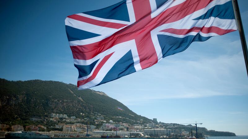 Union jack flutters from a vessel sailing by Rock of Gibraltar. Photograph: Jorge Guerrero/AFP/Getty Images