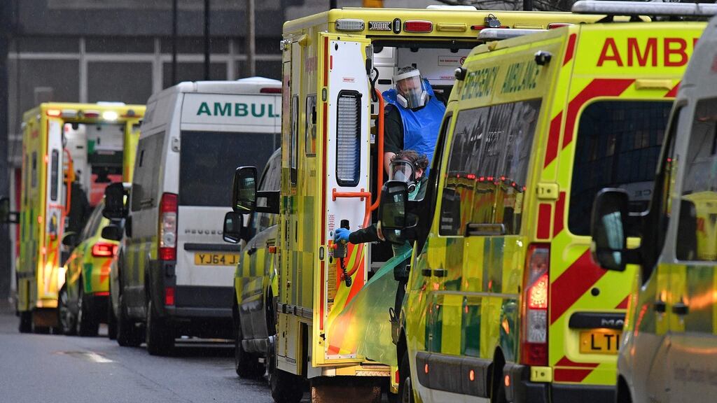 Paramedics are seen in a line of ambulances outside the Royal London Hospital, Britain. Northern Ireland reported another 26 Covid-19 deaths over the weekend. Photograph: Justin Tallis/AFP via Getty Images
