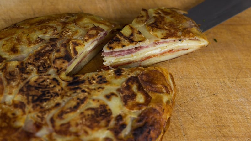 Potato cake stuffed with cheese and cured meats. Photograph: Emma Jervis