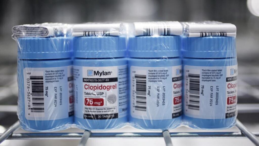 A generic form of the drug Plavix sits on crates at a Mylan Pharmaceuticals distribution centre in North Carolina. Mylan has offered to acquire Perrigo for about $29 billion in what would be the latest mega-merger among drug makers if it is completed. Photograph: Travis Dove/The New York Times