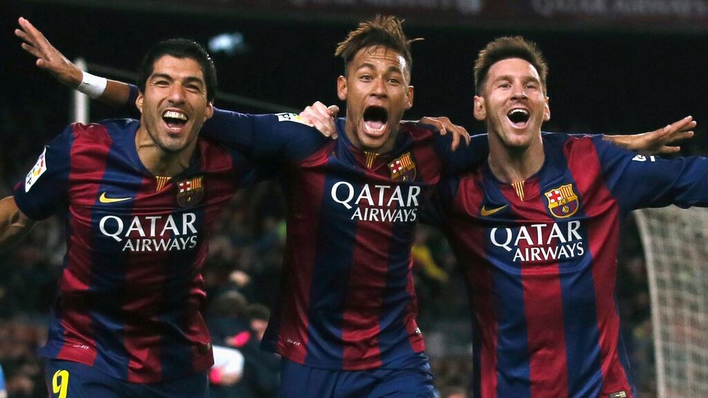 Barcelona’s Luis Suarez, Neymar and Lionel Messi celebrate a goal at Camp Nou stadium. Photograph: Albert Gea/Reuters