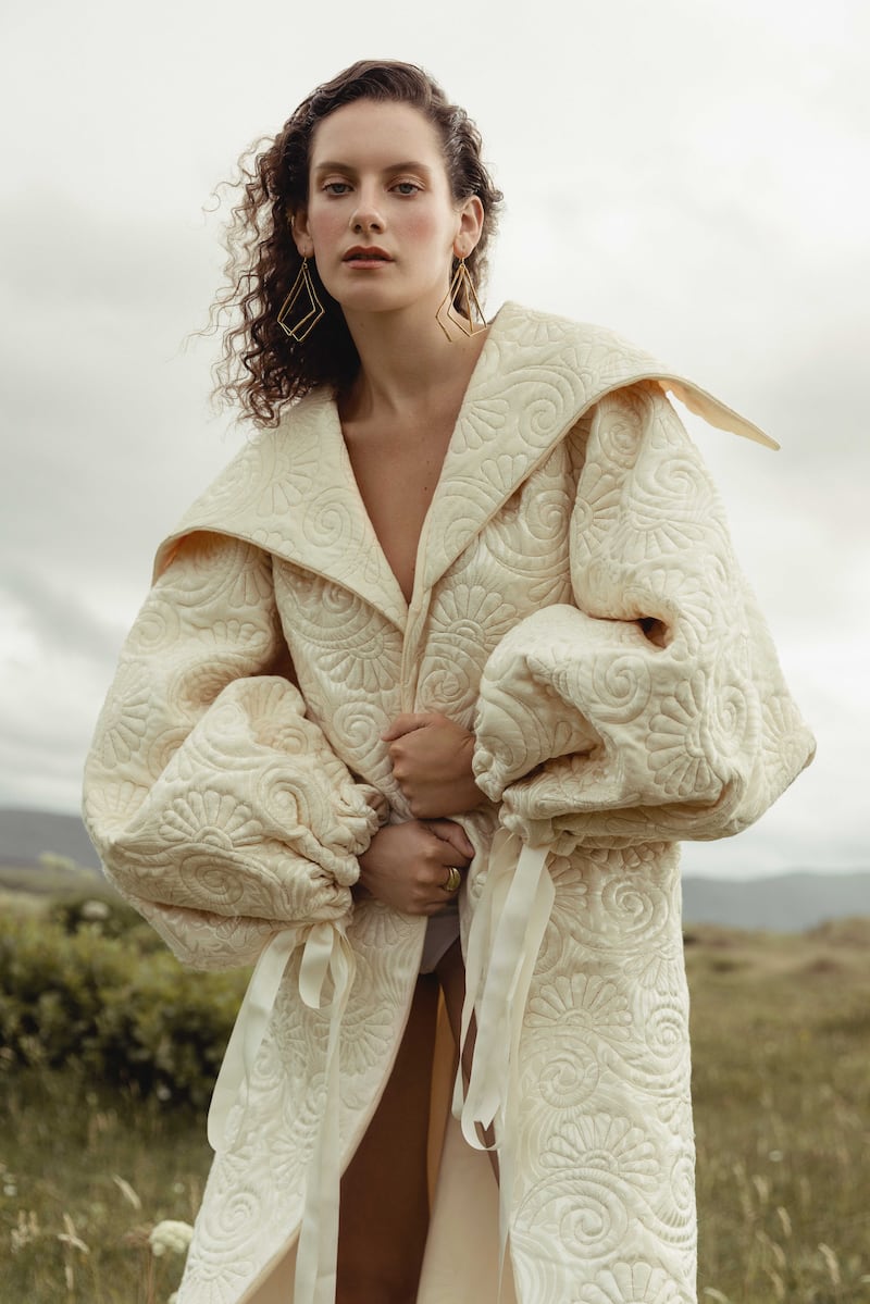 Dress coat by Anna Finnis Designs, Belfast School of Art graduate, earrings by DakiDaki, ring by Emer Roberts. Photograph: Chloe Aillud