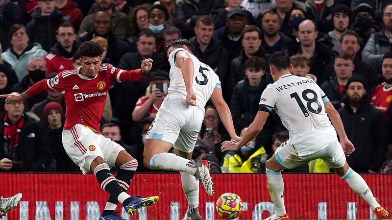 Sancho scores United’s second goal. Photo: Martin Rickett/PA Wire