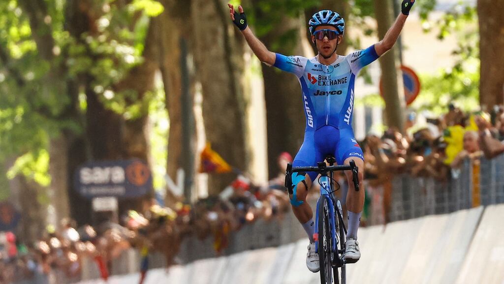 Simon Yates celebrates as he crosses the finish line to win the 14th stage of the Giro d’Italia from Santena to Turin. Photograph: Luca Bettini/AFP via Getty Images