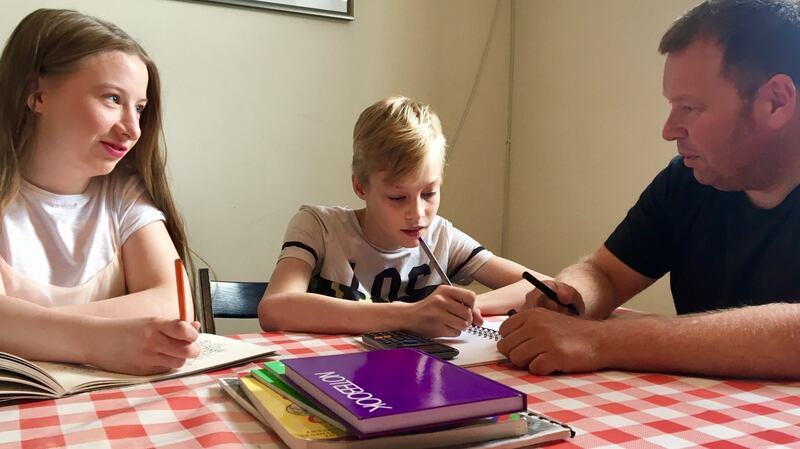 Alex and Dylan along with Solas Project co-ordinator Derek Murphy in Dublin’s south-west inner-city engaged in an after-school homework project.