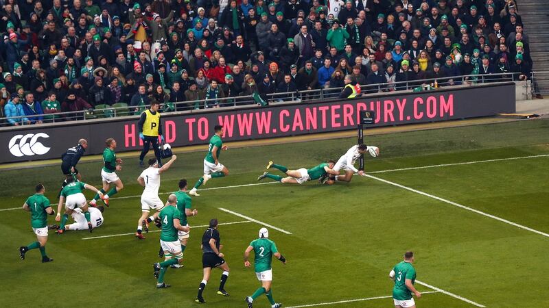 England’s Jonny May goes over in the corner for his side’s first try in the Six Nations match against Ireland at the Aviva stadium. Photograph: James Crombie/Inpho