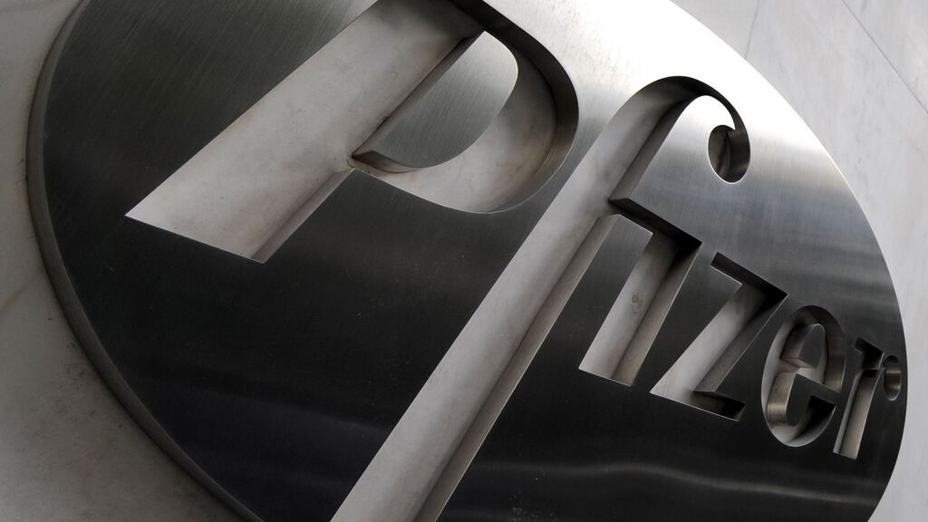 Pfizer reported a large drop in fourth-quarter earnings due to higher expenses and the strong dollar, but said it was on track to complete its takeover of Allergan. (Photograph: TIMOTHY A. CLARY/AFP/Getty Images)