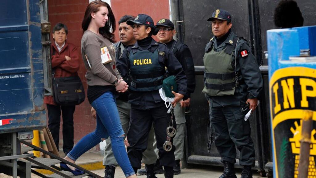 Michaella McCollum Connolly is escorted from a truck to court at Sarita Colonia prison in Callao. Photograph: Mariana Bazo/Reuters