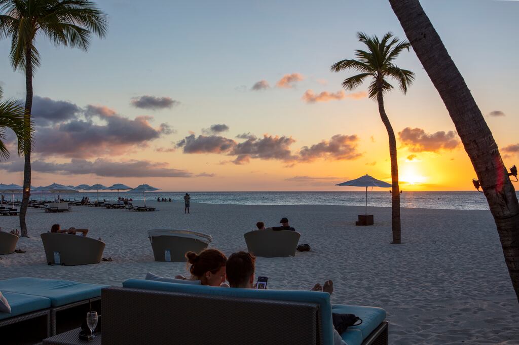 Sunset from the Bucuti & Tara Beach Resort on the island of Aruba, where the weather is usually warm and sunny all year round. Photograph: Scott Baker/The New York Times