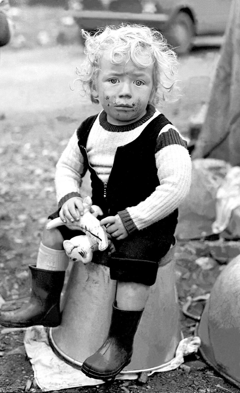 A classic Henry Wills photograph: The boy on the bucket