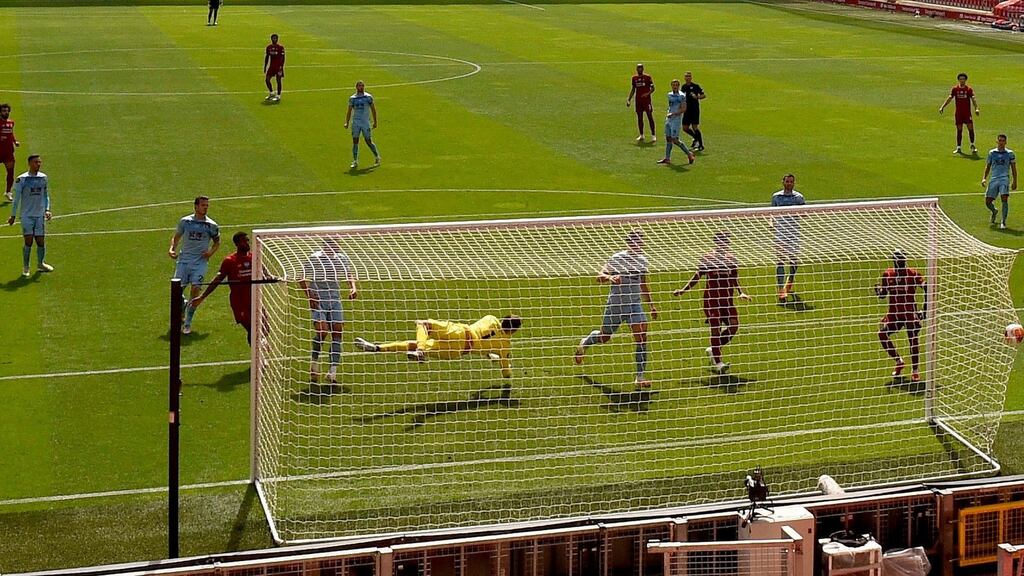 Liverpool’s Andy Robertson scores his side’s opening goal during the Premier League match against Burnley at Anfield. Photo: Oli Scarff/NMC Pool/PA Wire