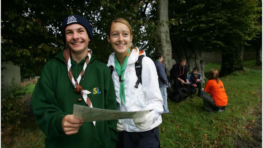 Andrew Kennedy and Roxanne Byrne (foreground) and fellow members of Scouting Ireland as they participated in a Walk in the Park event in aid of Cancer Research at St James’ Hospital Dublin Photograph: Bryan O’Brien
