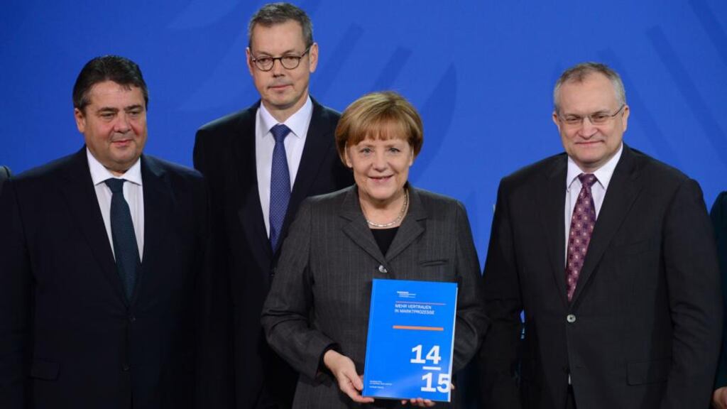 German Chancellor Angela Merkel with Prof Peter Bofinger (second left) at a presentation of a report by Germany’s “five wise men” who advise the federal government on economic affairs. Also pictured is Sigmar Gabriel (left), vice-chancellor and minister for economic affairs, and the chairman of the German Council of Economic Experts Christoph M Schmidt (right). Photograph: John MacDougall/AFP/Getty Images