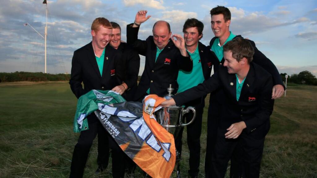 Ireland’s five Walker Cup winners Gavin Moynihan, Paul Dunne, Cormac Sharvin, Gary Hurley and Jack Hume with Britain and Ireland captain Nigel Edwards after yesterday’s triumph at Royal Lytham. Photograph: David Cannon/Getty Images.
