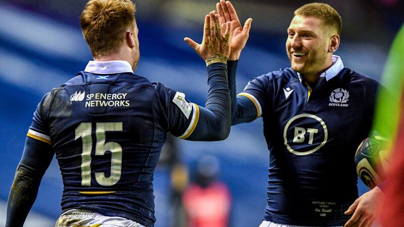 Scotland’s Stuart Hogg celebrates scoring a try against Wales with Finn Russell: Hogg wants Ireland to kick him the ball as much as Matt Fagerson will show how a number eight should use footwork in tandem with ferocity. Photograph: Craig Watson/Inpho