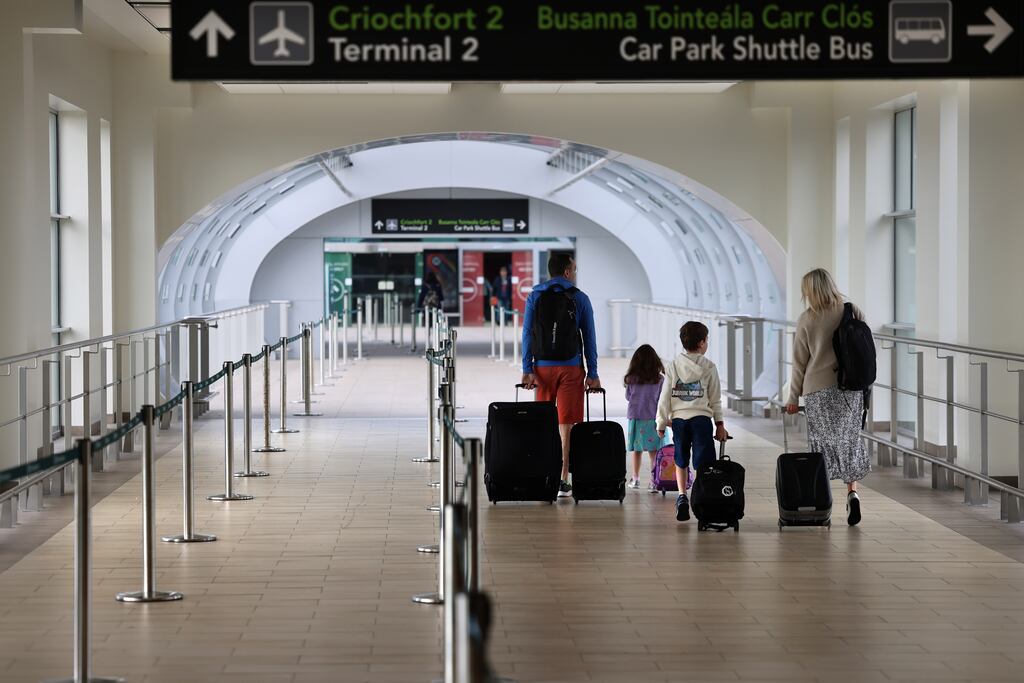 The family arrived with the suggested 3 hours and 30 minutes time before an international flight and had time for a coffee before going to their boarding gate. Photograph: Dara Mac Dónaill
