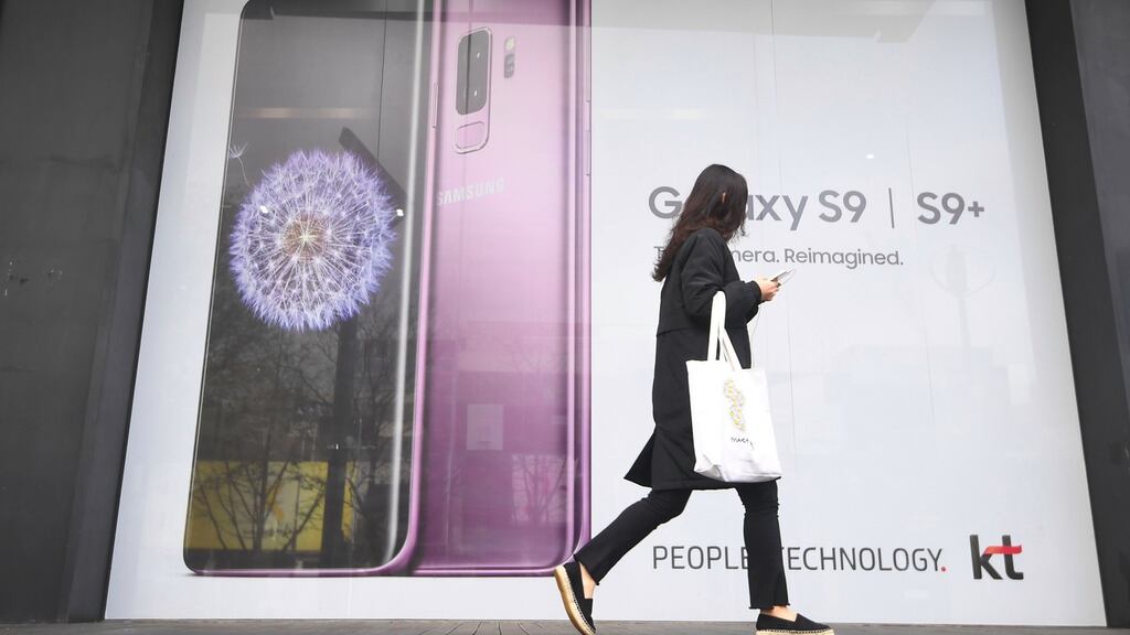 A jury in a 2012 trial had determined Samsung should pay Apple $1.05 billion, but a US district judge reduced that amount to $548 million. Photograph: Jung Yeon-je/AFP/Getty Images