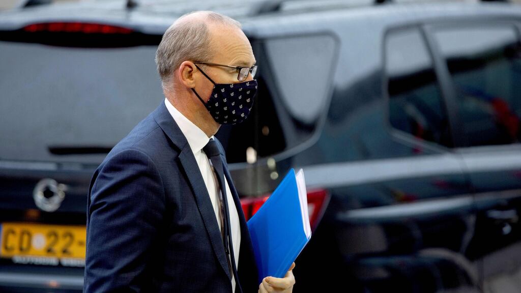 A masked Minister for Foreign Affairs Simon Coveney pictured arriving for a meeting of EU General Affairs ministers at the European Council building in Luxembourg earlier this week. Photograph: Virginia Mayo/AFP via Getty Images