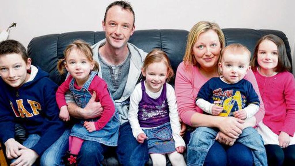 Damien and Karen OConnell, with their children Mark (12), Aimee (3), Emma (4), Dylan (18 months) and Katie (7), at Hollywood, Co Wicklow. photograph: eric luke