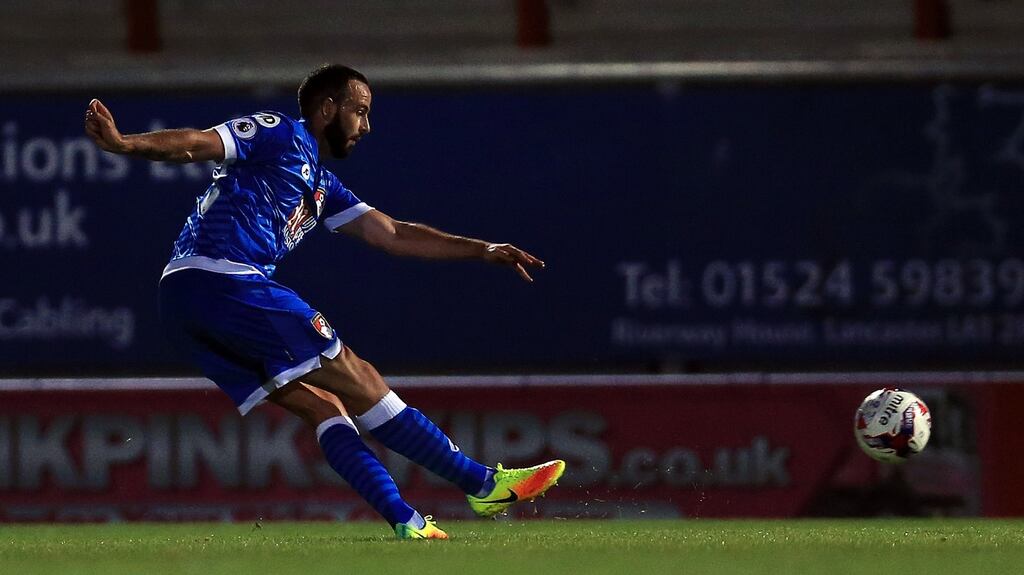 Marc Wilson scores  Bournemouth’s second goal   during the EFL Cup  match against Morecambe at the Globe Arena. Photograph: Clint Hughes/PA Wire