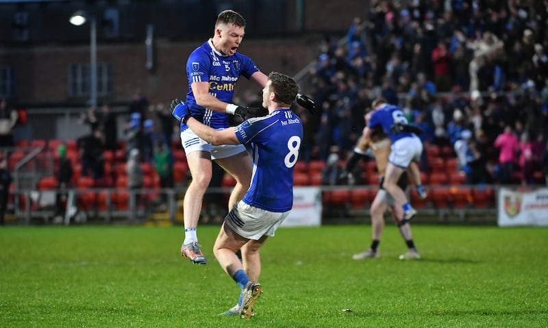 Conor McCarthy and Darren Hughes of Scotstown celebrate at the final whistle after victory over Kilcoo at Páirc Esler, Newry. Photograph: Andrew Paton/Inpho