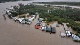 Record floodwaters in eastern Australia leave two dead and two missing