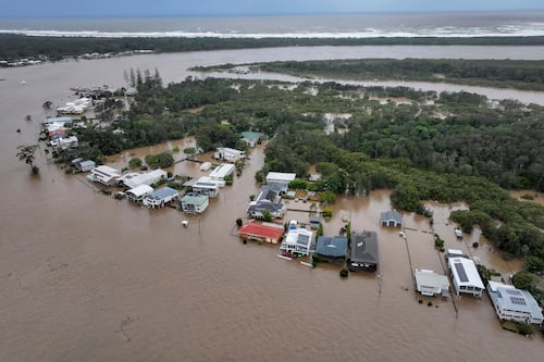 Record floodwaters in eastern Australia leave two dead and two missing