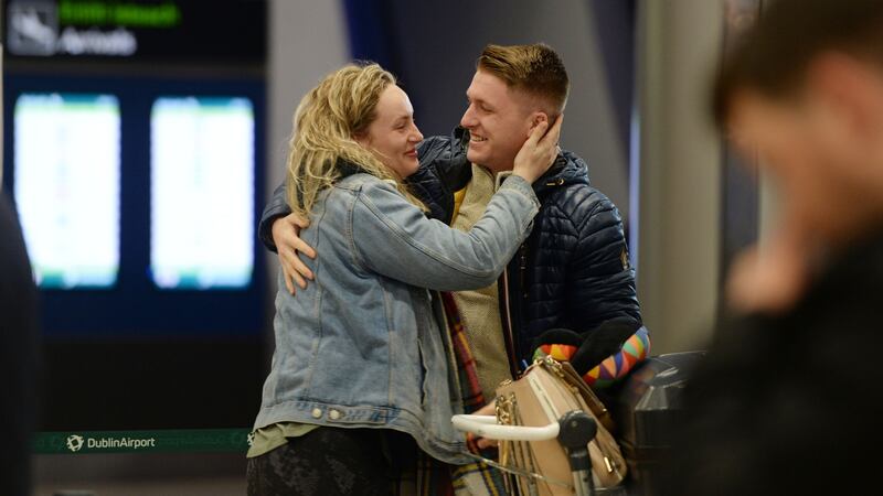 David Donnelly greeting his sister Abigail after she arrived from New York. Photograph: Alan Betson / The Irish Times