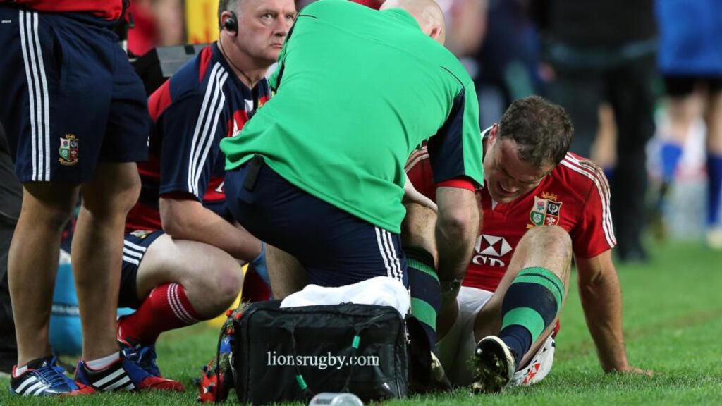 Jamie Roberts receives treatment for an injury in Sydney this morning. Photograph: Dan Sheridan/Inpho