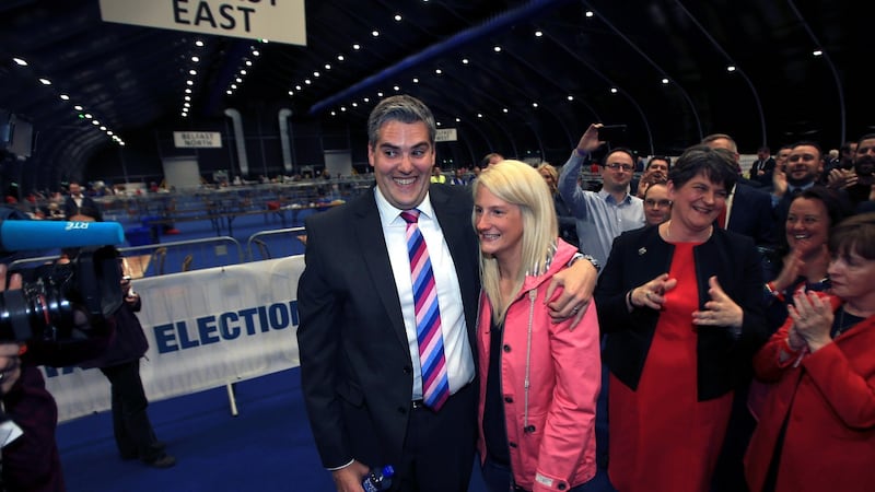The DUP’s Gavin Robinson celebrates with his wife, Lindsay, after winning his Westminster seat at the Belfast count centre. Photograph: Paul McErlane/EPA
