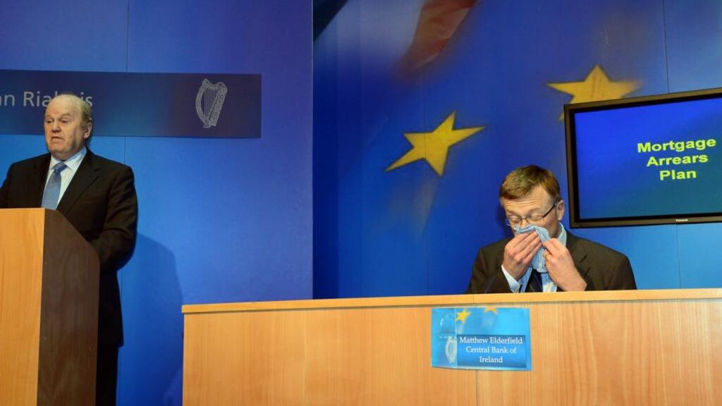 Minister for Finance Michael Noonan T.D., and Matthew Elderfield Head of Financial Regulation at the Central Bank photographed at Government Buildings at the Mortgage Arrears Plan announcement yesterday. Photograph: Brenda Fitzsimons / The Irish Times