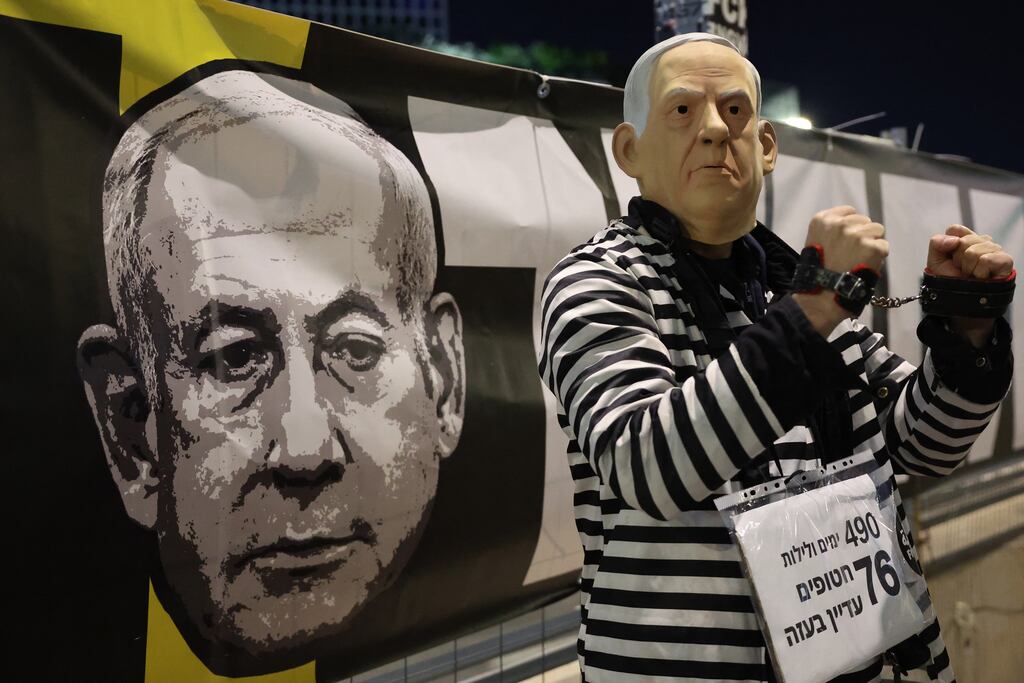 A demonstrator wearing a Binyamin Netanyahu mask during a protest calling for the release of hostages held captive in Gaza since the October 7th, 2023 attack by Palestinian militants, in front of the Israeli Defence Ministry in Tel Aviv, on February 8th, 2025. Photograph: Jack Guez/AFP/Getty