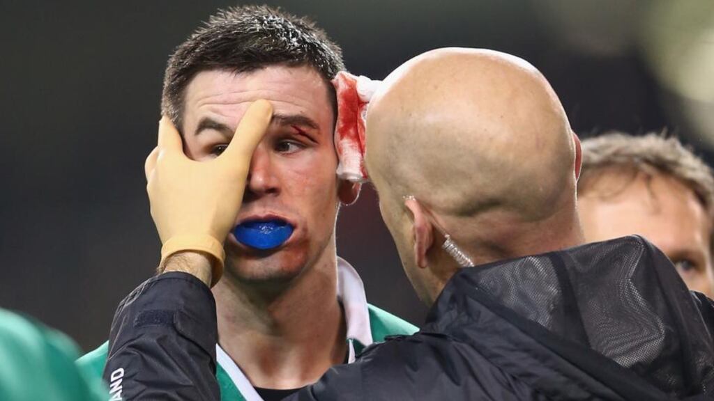 Ireland outhalf Jonathan Sexton  is given treatment for a cut to his eye after a clash of heads with France’s Mathieu Bastareaud during the Six Nations at Aviva Stadium. Photograph:   Michael Steele/Getty Images