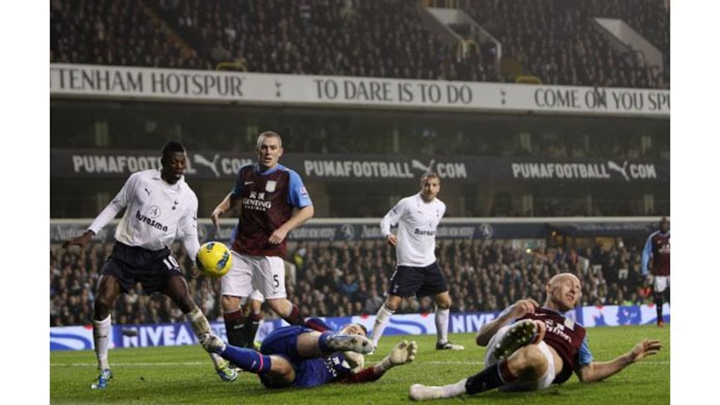 Tottenham striker Emmanuel Adebayor makes the most of a mix-up between Aston Villa goalkeeper Shay Given and defender James Collins to score his second goal at White Hart Lane. – (Photograph: Scott Heavey/Getty Images).