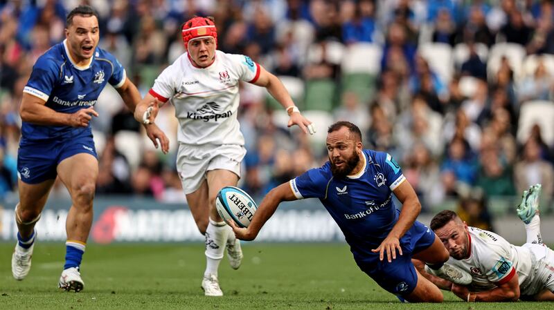 Jamison Gibson-Park offloads as he is tackled by John Cooney. Photograph: Ben Brady/Inpho