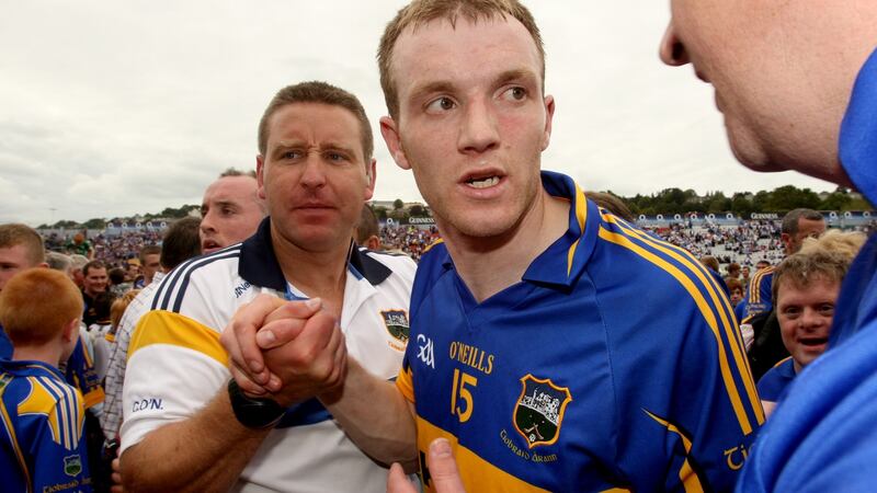 O’Neill celebrates with Lar Corbett after winning the 2011 Munster SHC during his time with Tipperary. Photo: James Crombie/Inpho