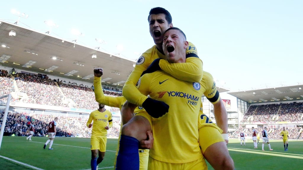 Ross Barkley celebrates his goal against Burnley with Alvaro Morata. Photograph: Nigel Roddis/Getty