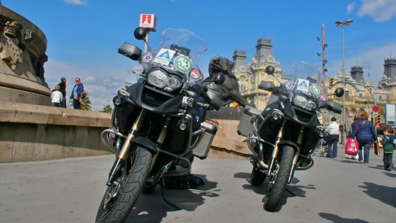 Bikes parked beside the Christopher Columbus statue in Barcelona