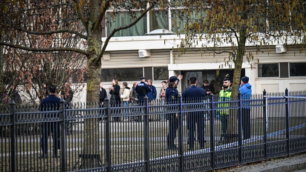 Police officers attend the scene at a school in Malmo, Sweden. Photograph: Johan Nilsson/TT via AP