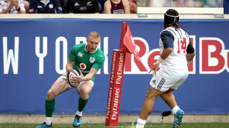 Keith Earls scores the first try of the game. Photograph: Ryan Byrne/Inpho